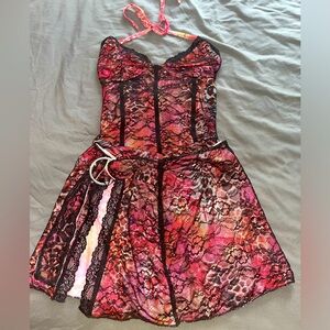 Two piece by Outcast. Medium, but it's really a small or XS.